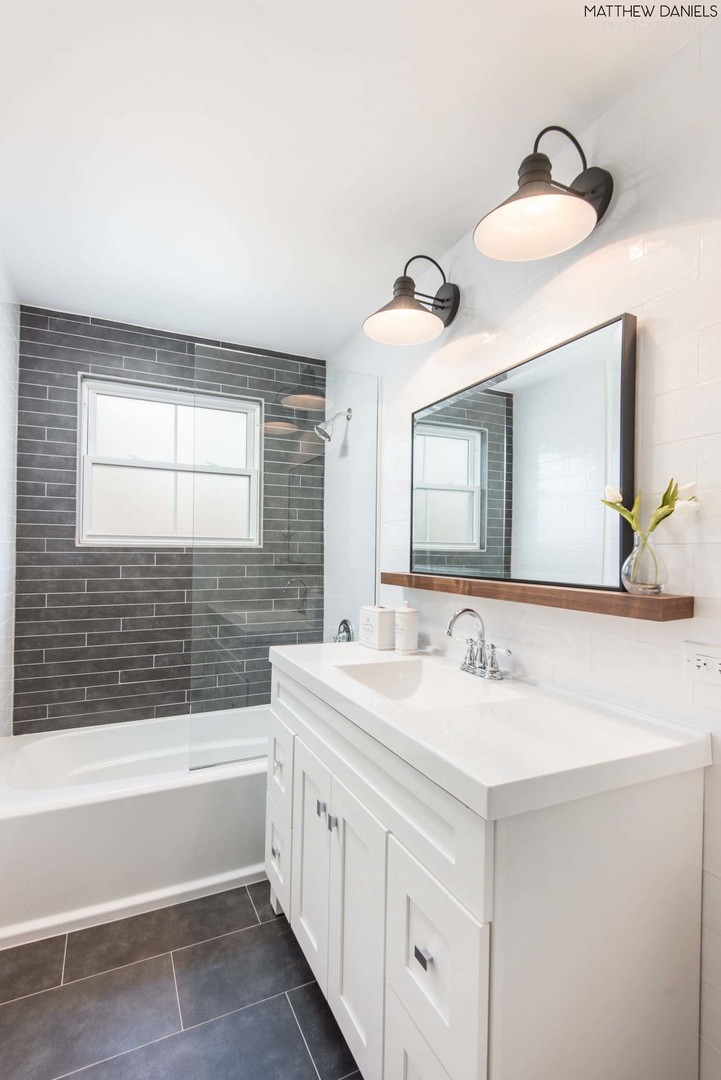 426 Shermer Road Glenview, IL 60025 - Photo 21 of 52 a bathroom with a sink and a mirror