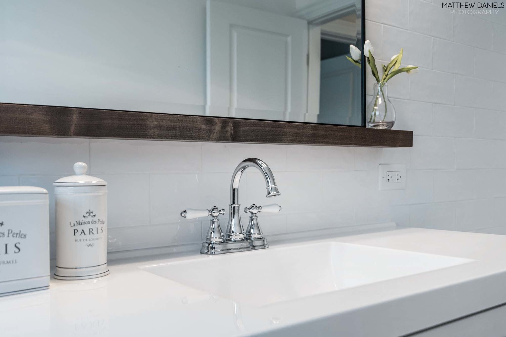 426 Shermer Road Glenview, IL 60025 - Photo 24 of 52 a bathroom with a sink and a mirror