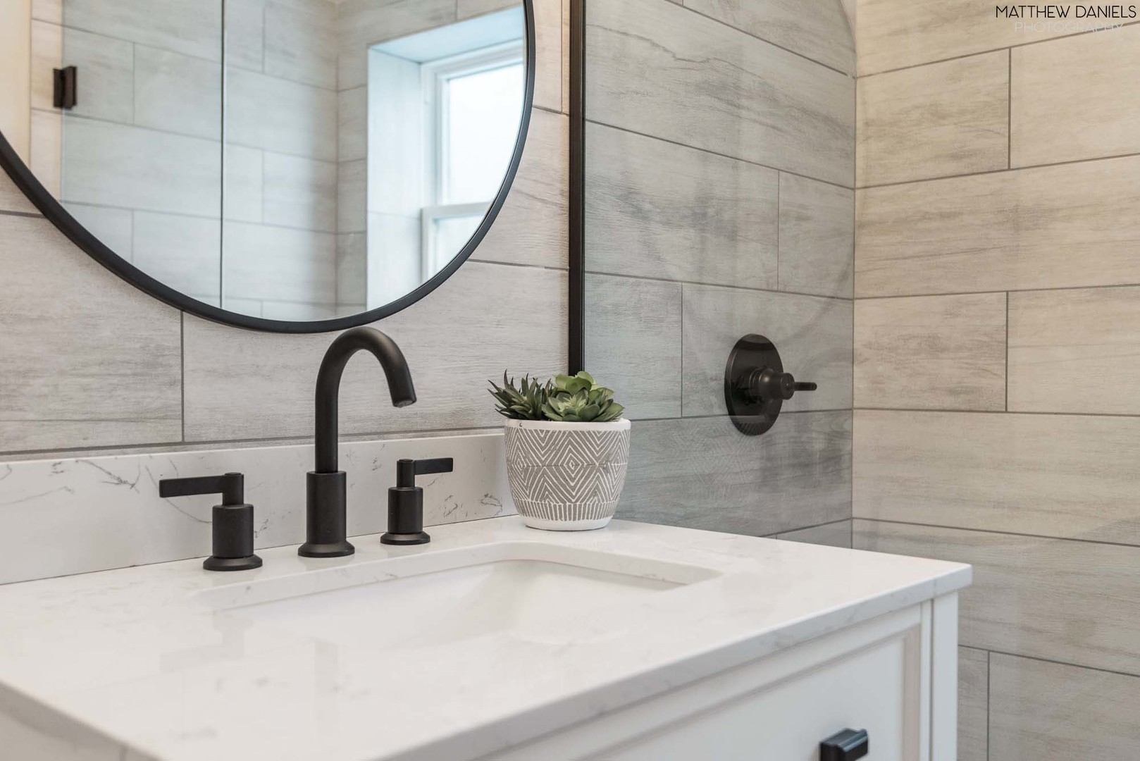 426 Shermer Road Glenview, IL 60025 - Photo 34 of 52 a bathroom with a sink and a mirror