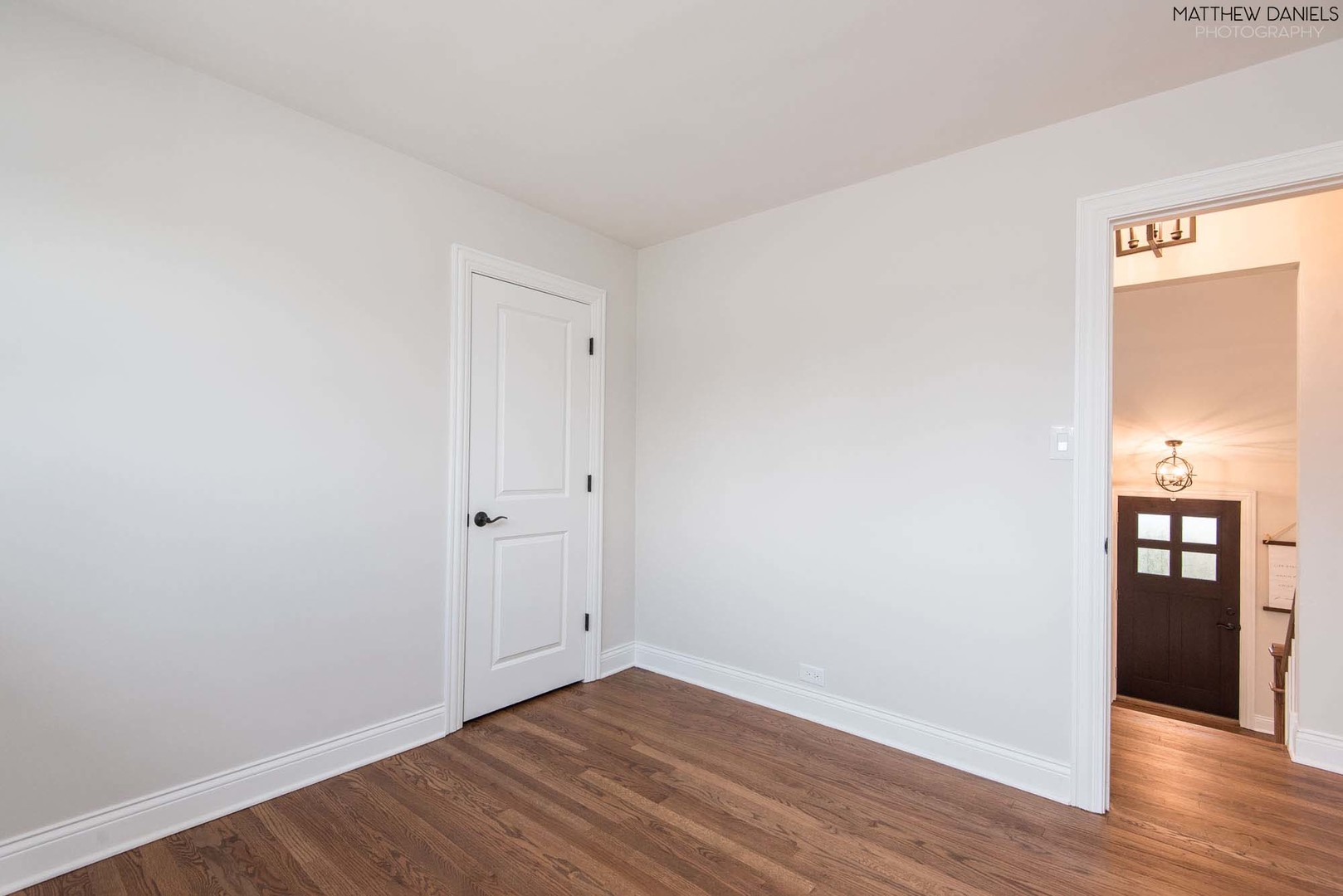 426 Shermer Road Glenview, IL 60025 - Photo 38 of 52 a view of an empty room with wooden floor