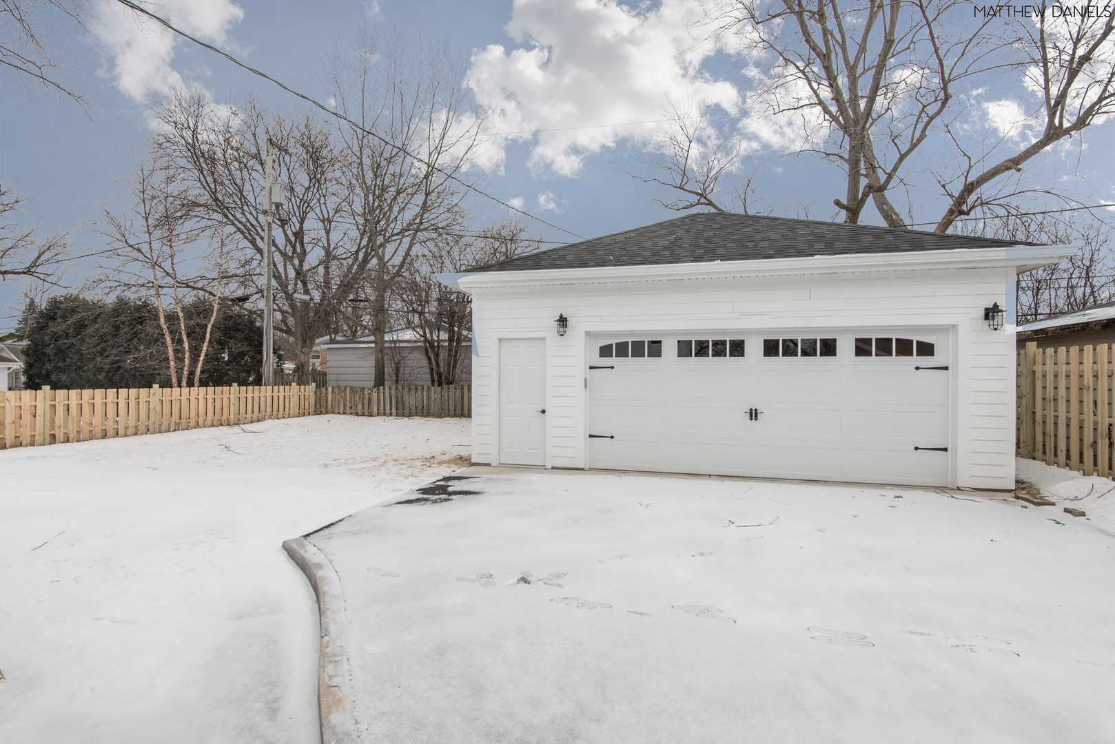 426 Shermer Road Glenview, IL 60025 - Photo 44 of 52 a view of white house with a snow in the yard