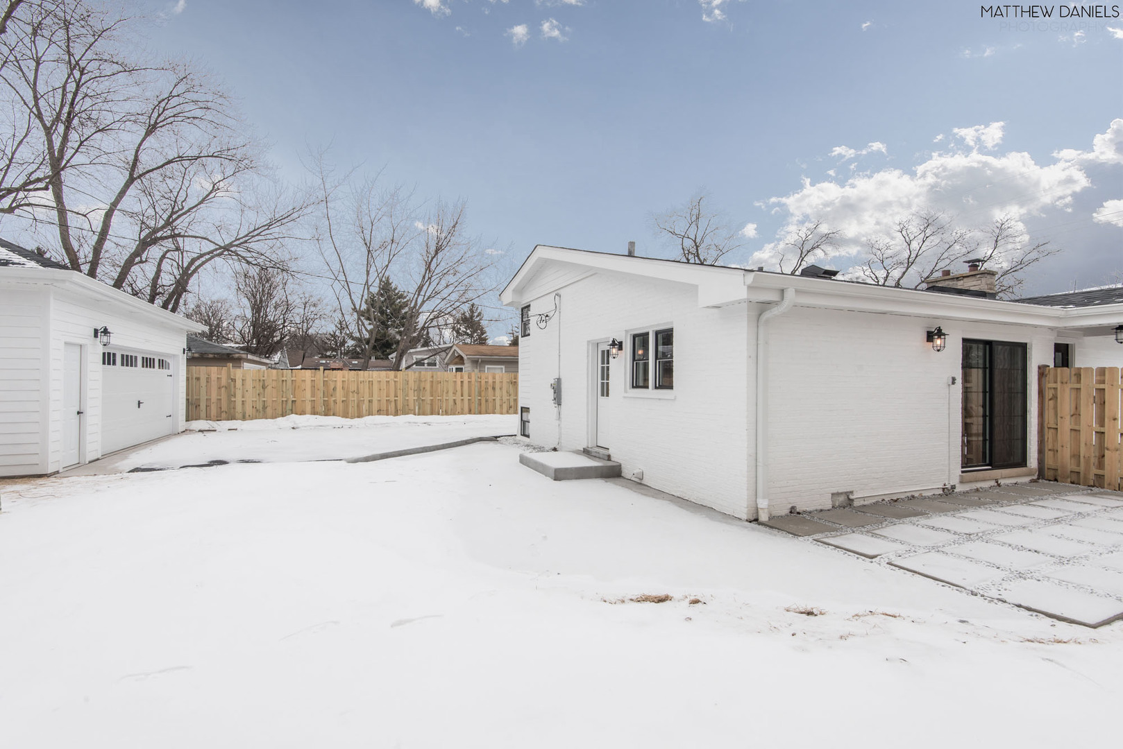 426 Shermer Road Glenview, IL 60025 - Photo 46 of 52 a view of a house with a snow in front of it