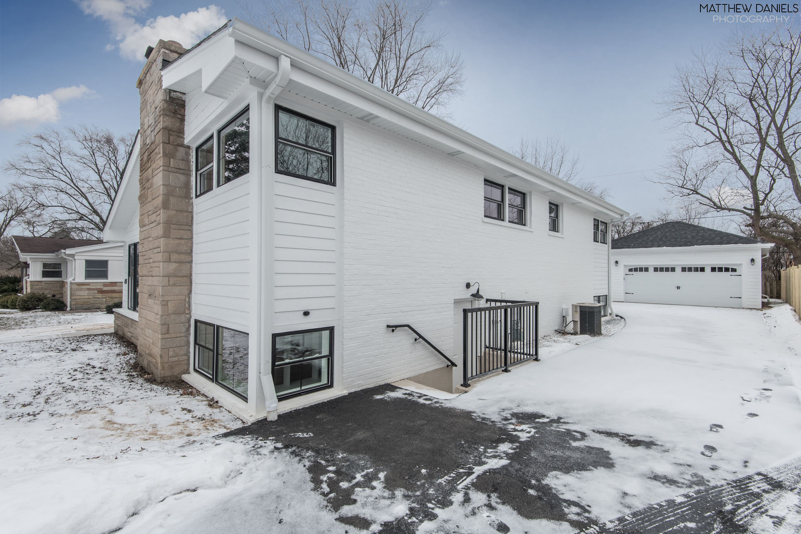426 Shermer Road Glenview, IL 60025 - Photo 51 of 52 a view of a house with a snow in the yard