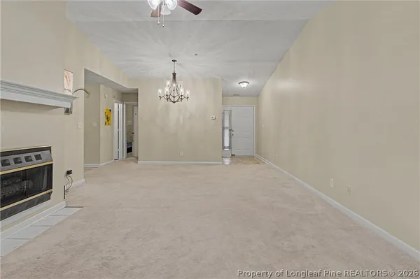 a view of a livingroom with a fireplace