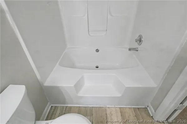 a bathroom with a bathtub