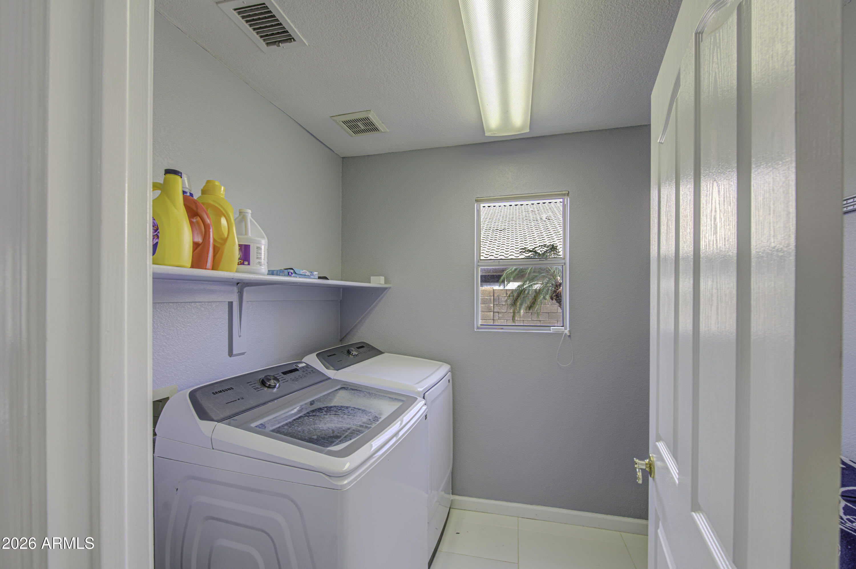 12403 West Monte Vista Road Avondale, AZ 85392 - Photo 47 of 63 a utility room with dryer and washer