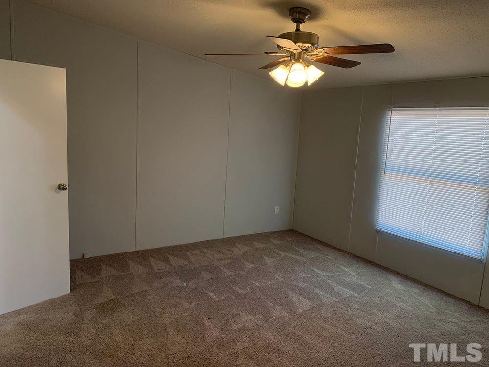 8834 South Creek Road Willow Spring, NC 27592 - Photo 5 of 20 Main Bedroom off of living room