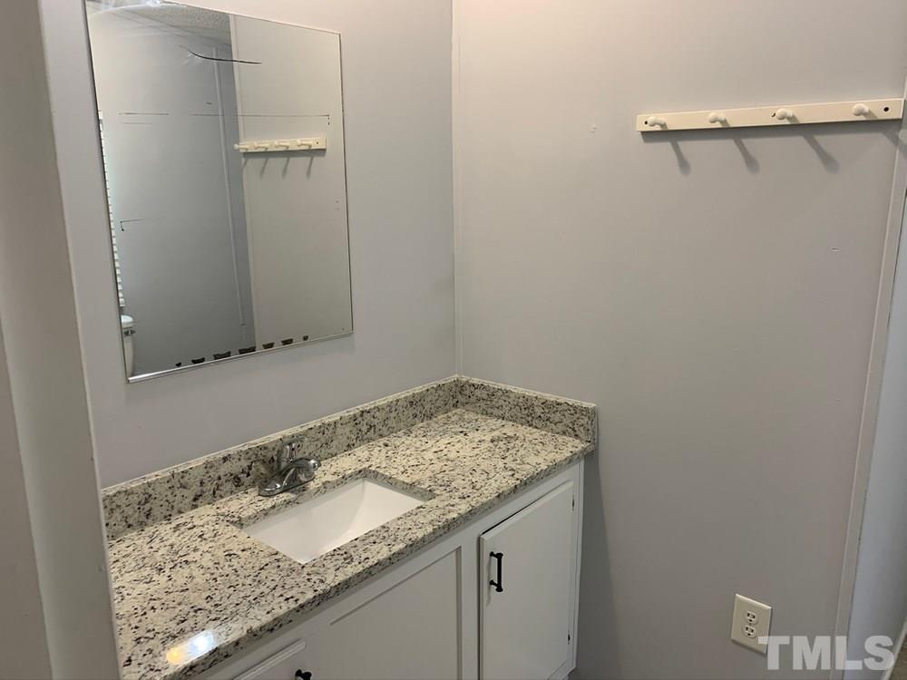 8834 South Creek Road Willow Spring, NC 27592 - Photo 7 of 20 Updated Main Bath with granite