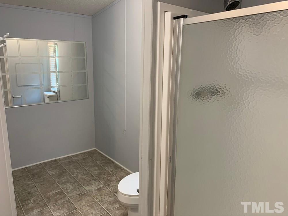 8834 South Creek Road Willow Spring, NC 27592 - Photo 8 of 20 Walk in shower in Main Bath