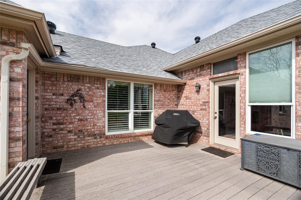 8913 Brierfield Road Granbury, TX 76049 - Photo 31 of 40 a front view of a house with a large window