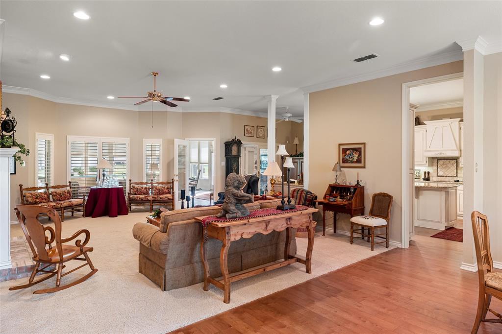 8913 Brierfield Road Granbury, TX 76049 - Photo 6 of 40 a living room with furniture and a large window
