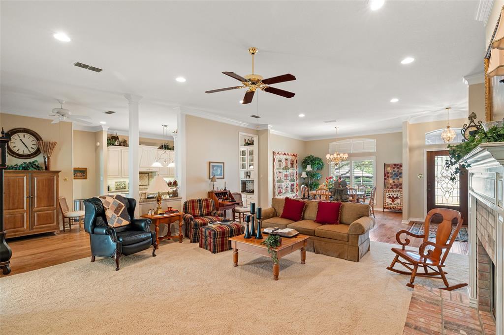 8913 Brierfield Road Granbury, TX 76049 - Photo 8 of 40 a living room with furniture and a large window