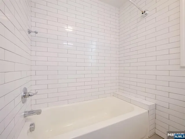 a view of a balcony with wooden floor