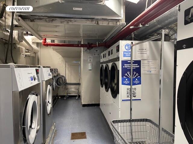 345 East 73rd Street, Unit 12D Manhattan, NY 10021 - Photo 12 of 12 a utility room with dryer and washer