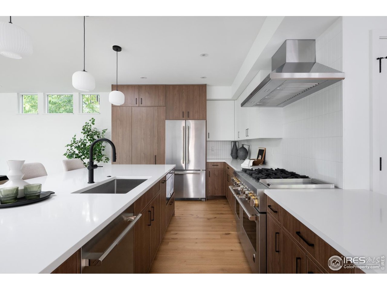 934 Spruce Street Boulder, CO 80302 - Photo 8 of 49 Gourmet chef's kitchen with spacious, hidden walk-in pantry
