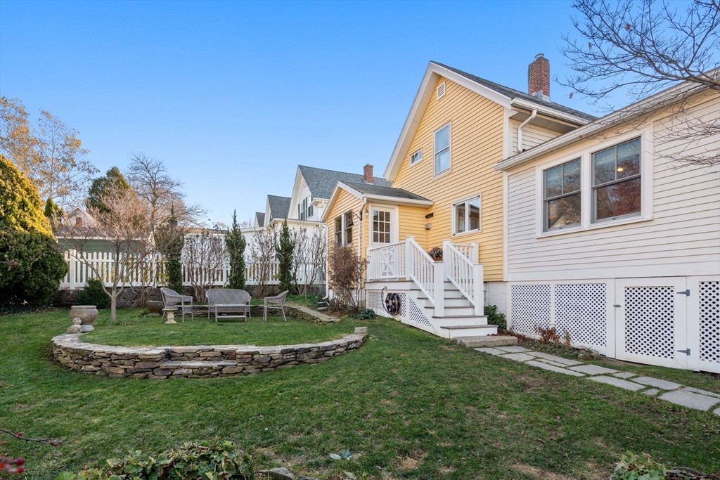 20 Haskell Street Gloucester, MA 01930 - Photo 17 of 27 a front view of a house with a yard