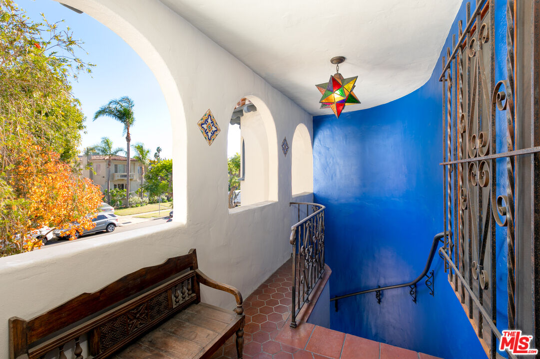 1169 Hi Point Street Los Angeles, CA 90035 - Photo 2 of 27 a living room with furniture