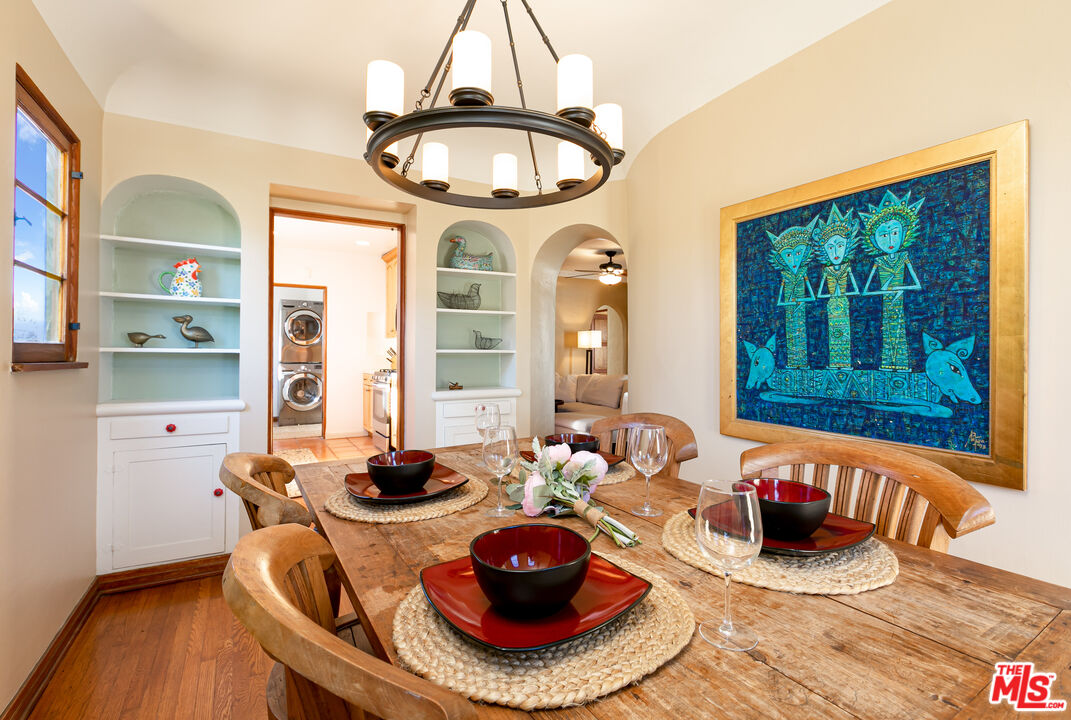 1169 Hi Point Street Los Angeles, CA 90035 - Photo 9 of 27 a table and chairs in a room