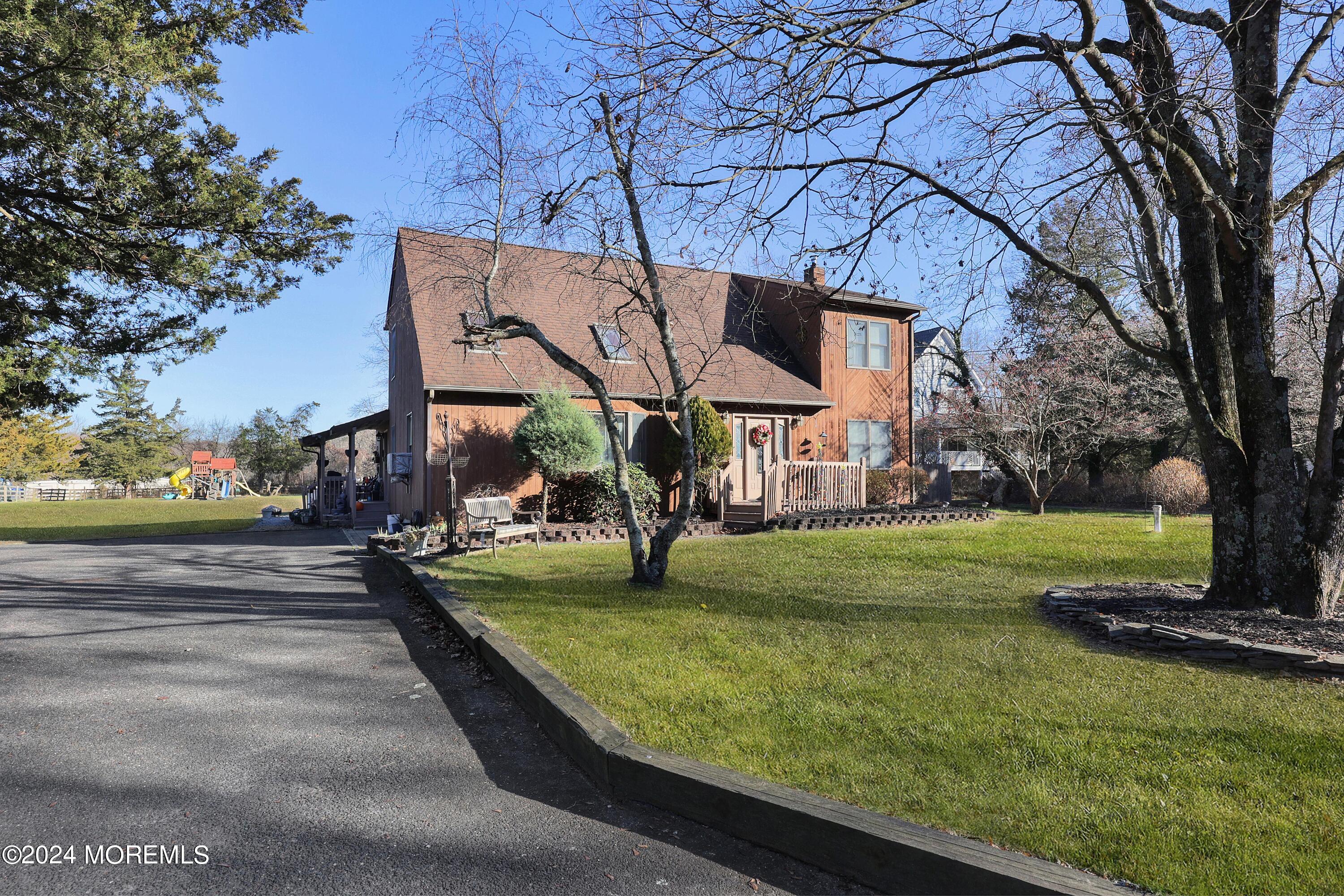 1058 Maxim Southard Road Howell, NJ 07731 - Photo 23 of 34 a view of a park with large trees