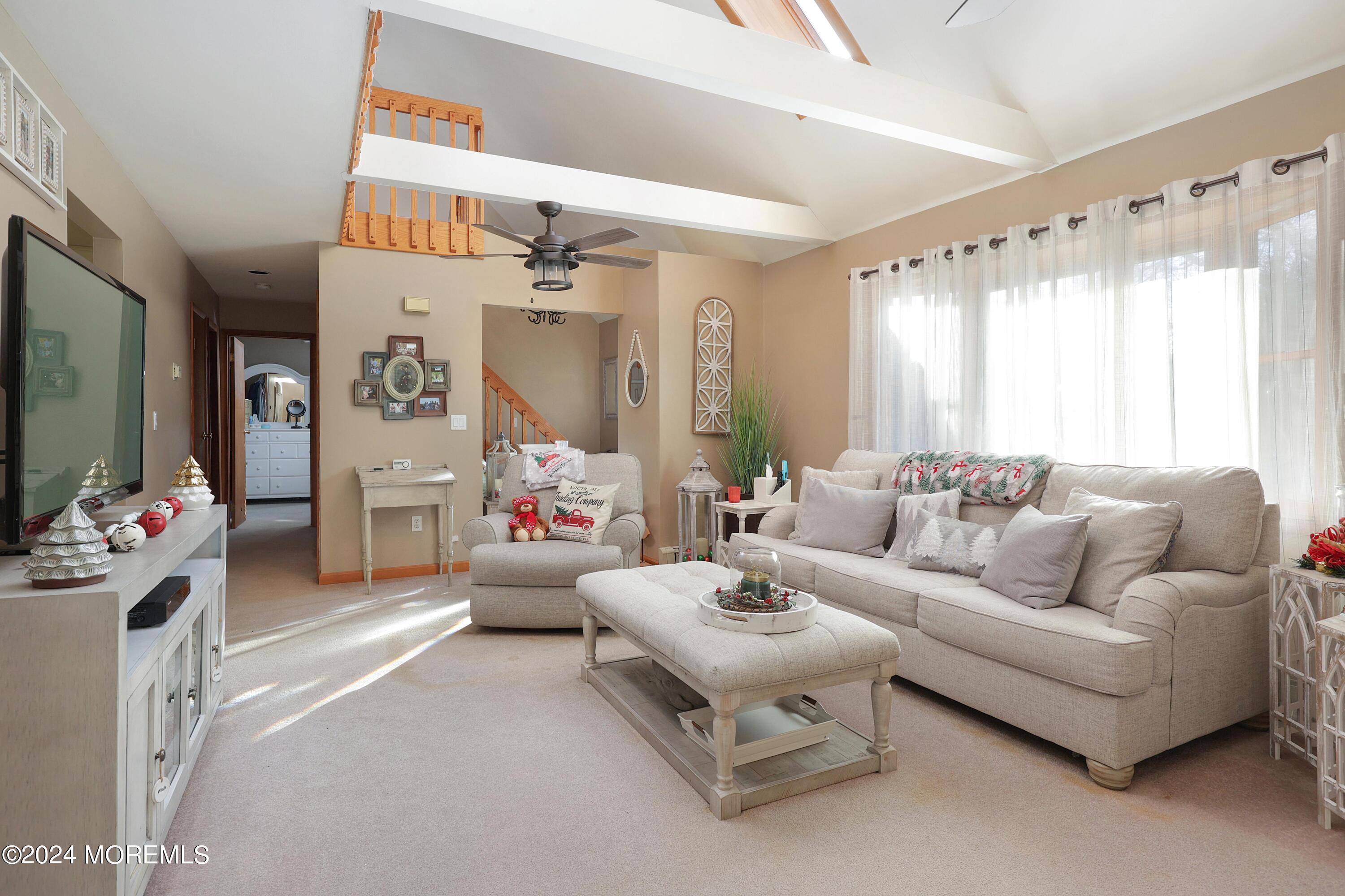 1058 Maxim Southard Road Howell, NJ 07731 - Photo 3 of 34 a living room with furniture and a flat screen tv