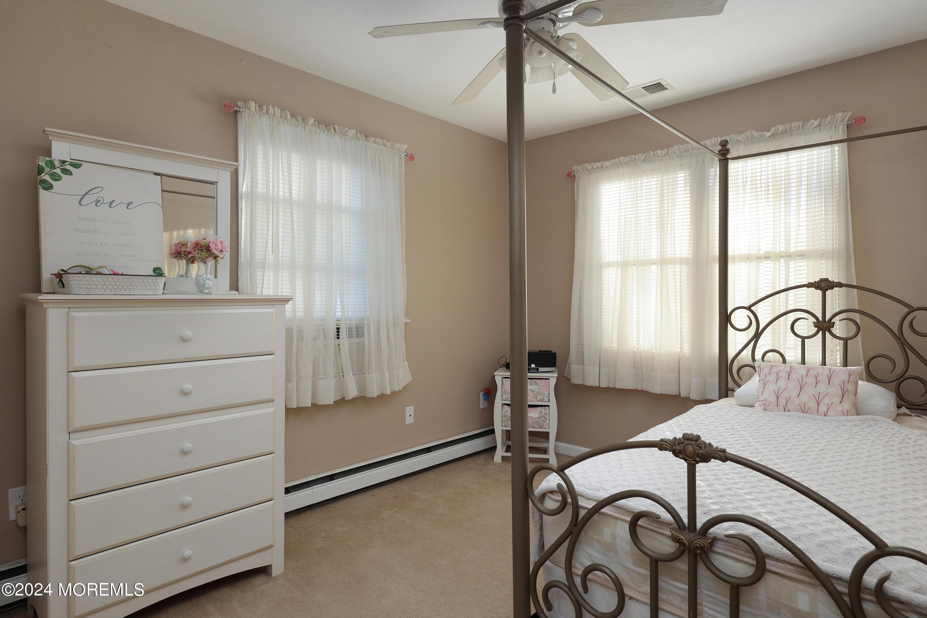 1058 Maxim Southard Road Howell, NJ 07731 - Photo 32 of 34 a bedroom with a bed and a window
