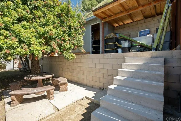 a view of house with outdoor space