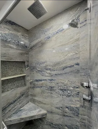a bathroom with a toilet and a sink