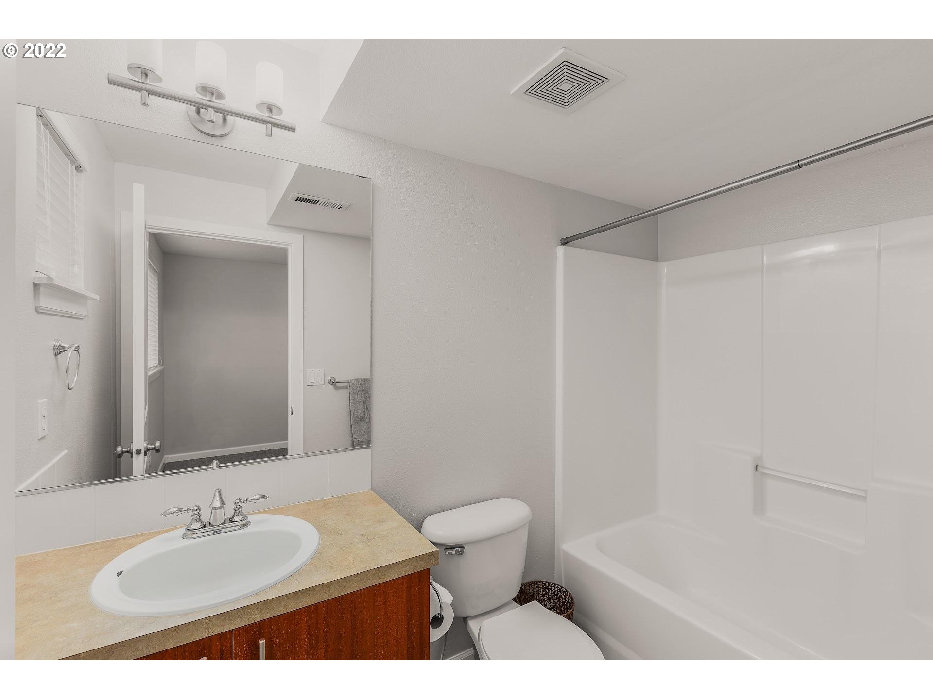 16695 Southwest Baseline Road Beaverton, OR 97006 - Photo 15 of 19 a bathroom with a sink toilet and shower