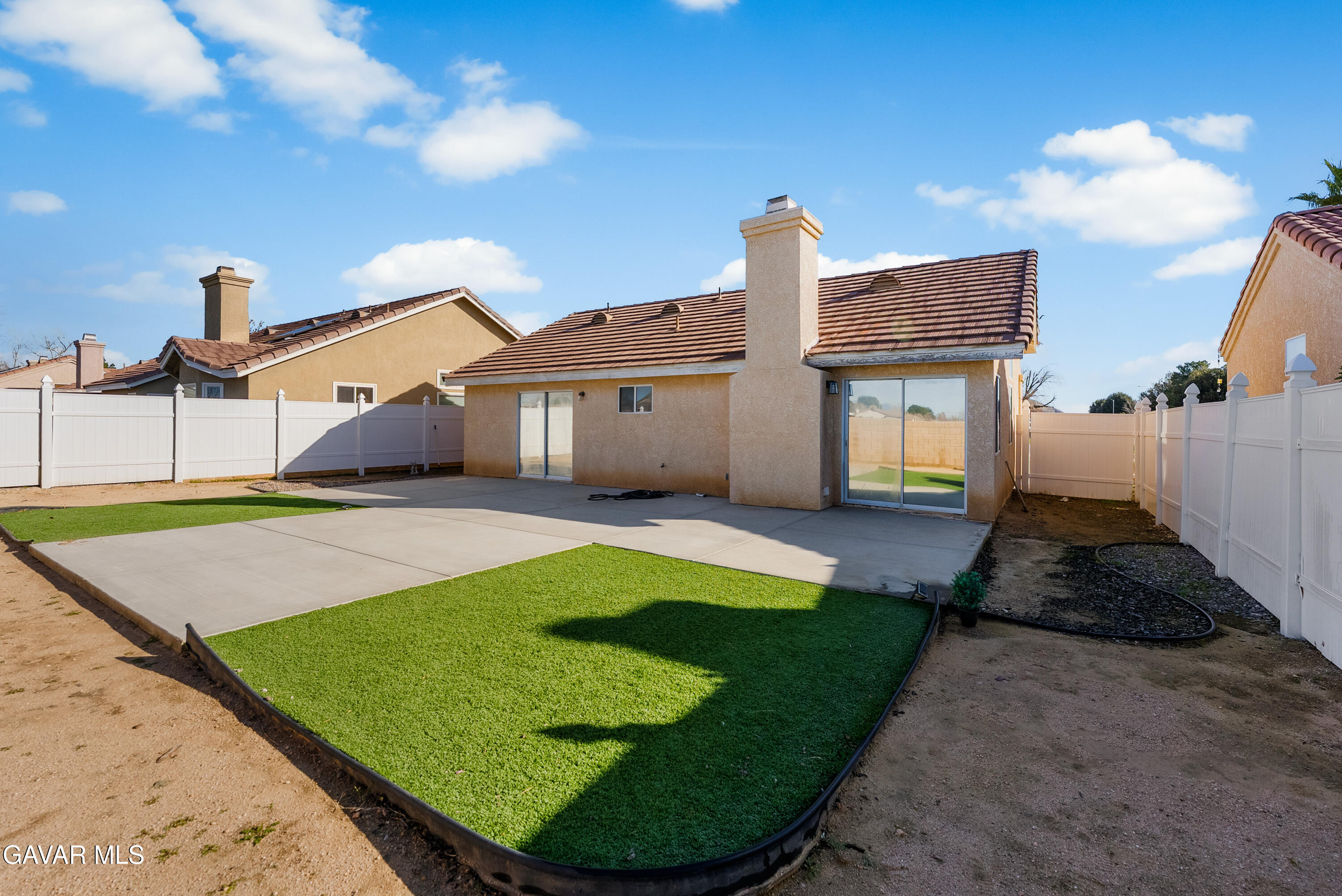 3209 Titcher Lane Rosamond, CA 93560 - Photo 32 of 36 a view of a house with pool and a yard