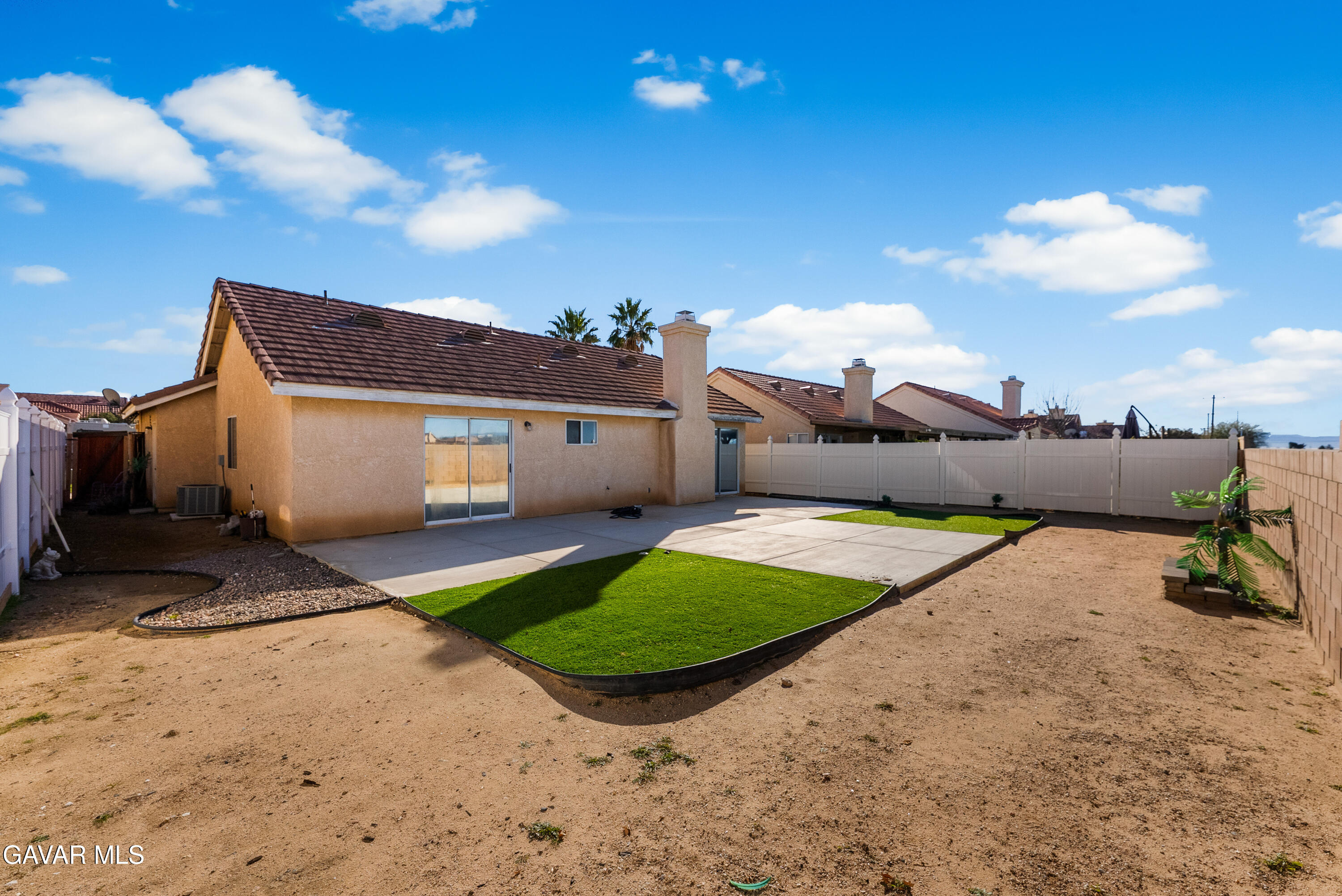 3209 Titcher Lane Rosamond, CA 93560 - Photo 34 of 36 a view of a house with backyard and a fire pit