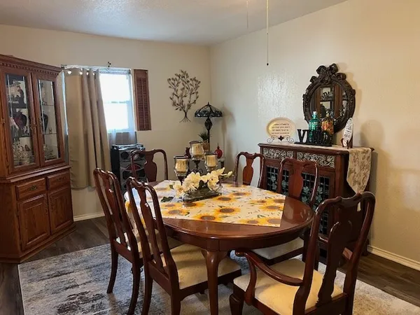 a view of a dining room with furniture