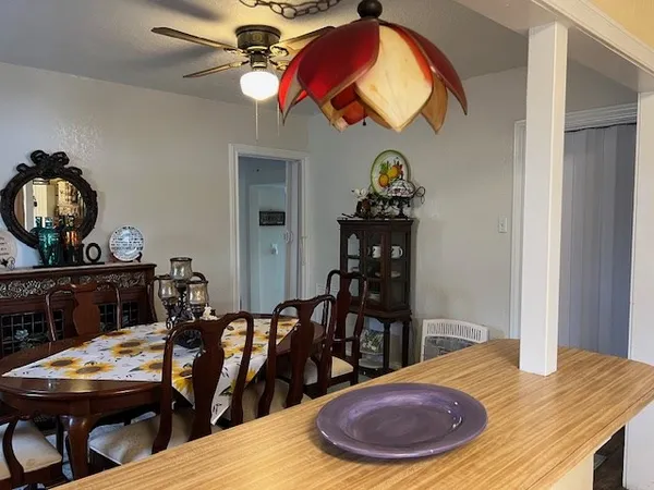 a view of a dining room with furniture