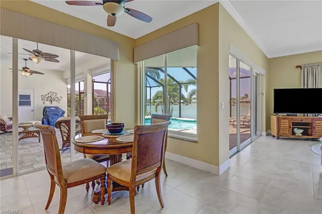 a view of a livingroom with furniture and a flat screen tv