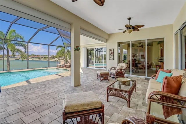 a outdoor space with patio the couches and a dining table with the garden view