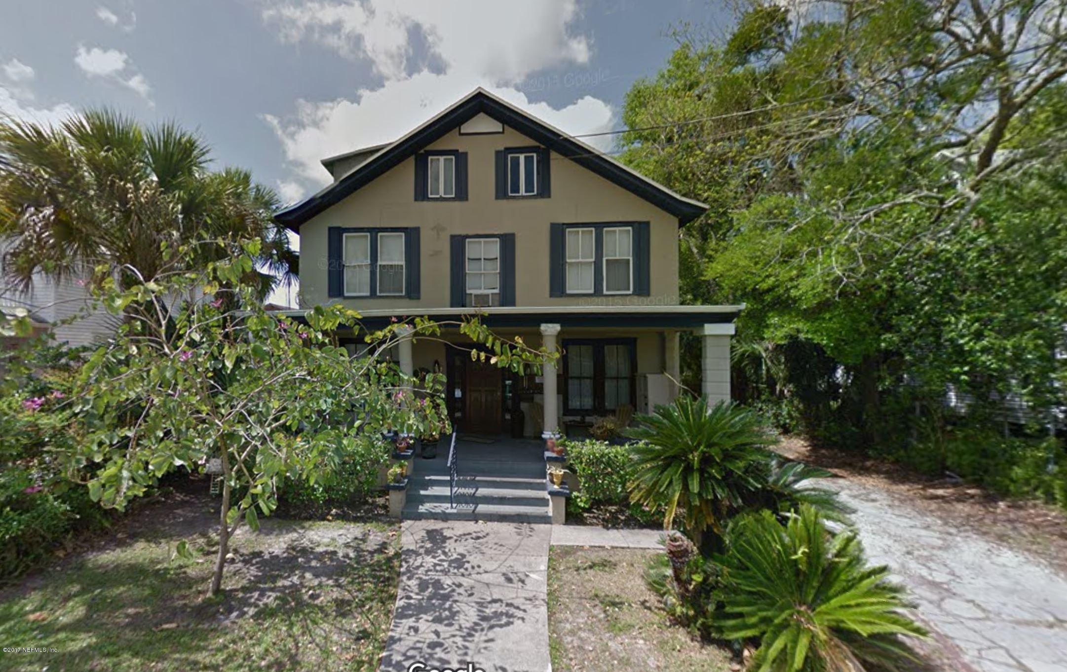 260 St George Street St. Augustine, FL 32084 - Photo 1 of 2 a front view of a house with a yard
