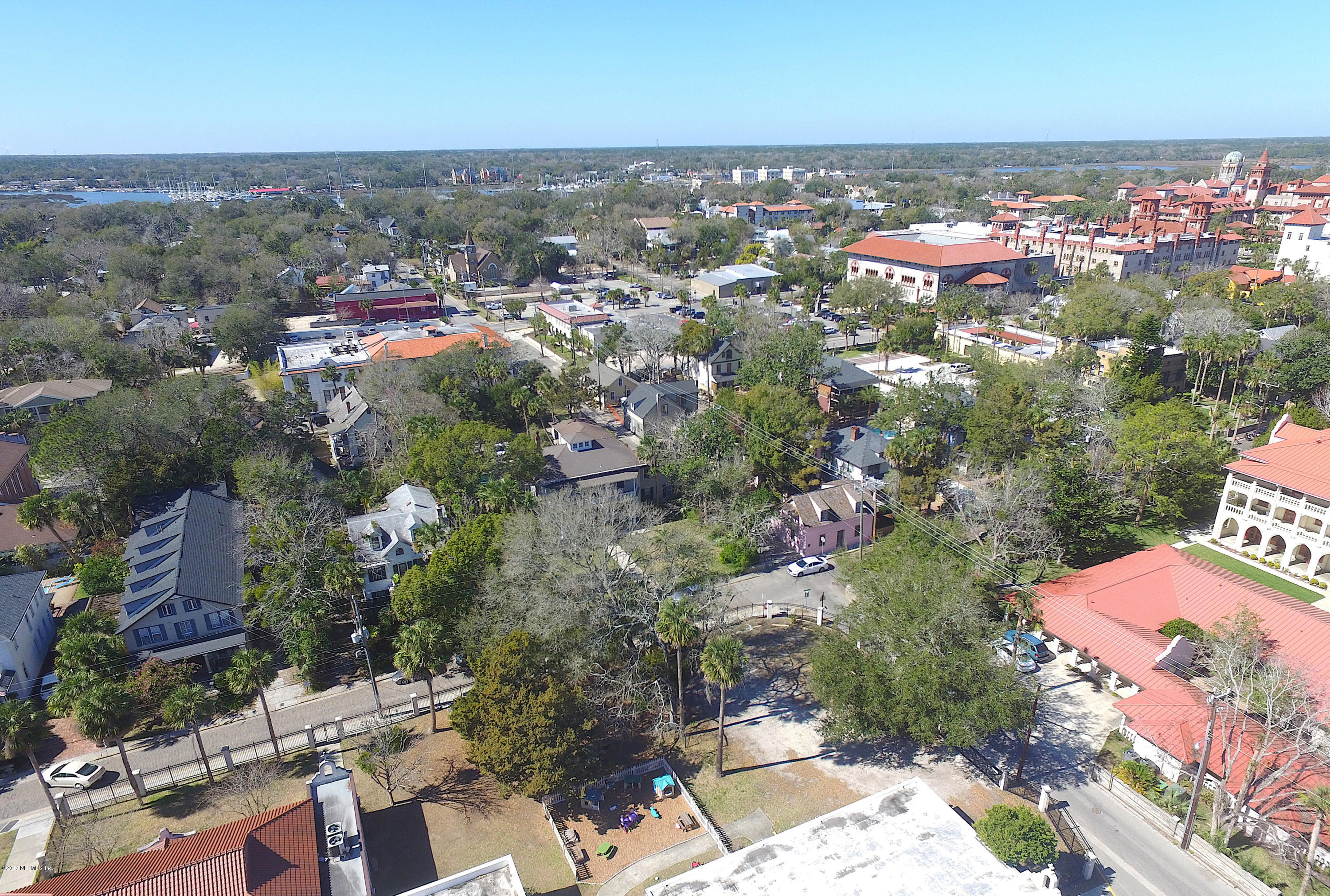 260 St George Street St. Augustine, FL 32084 - Photo 2 of 2 an aerial view of a city with lots of residential buildings