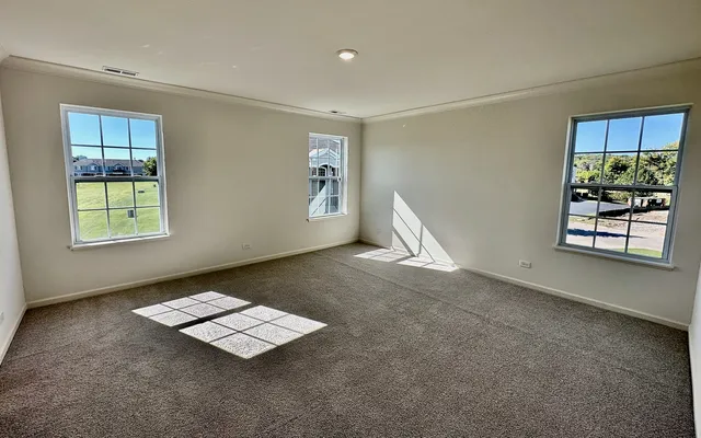 an empty room with windows