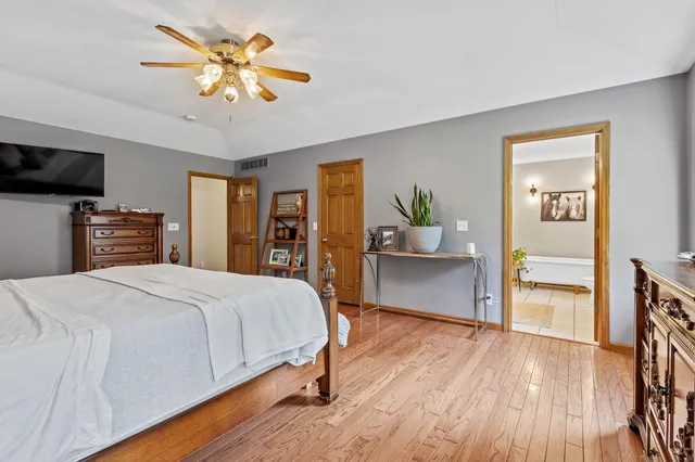 a view of a livingroom with furniture and a flat screen tv