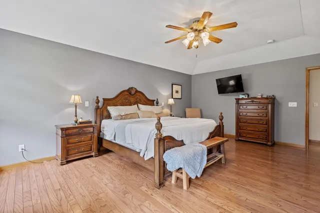a view of empty room with wooden walls