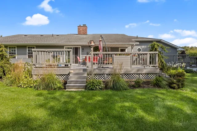 a view of an ocean and trees