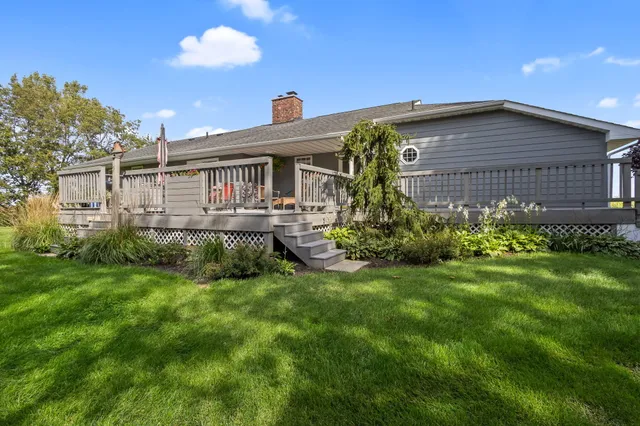 a view of a field with an trees