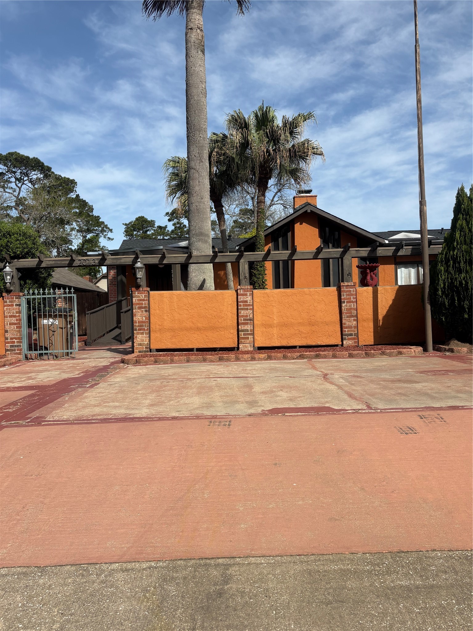 a house view with a garden space