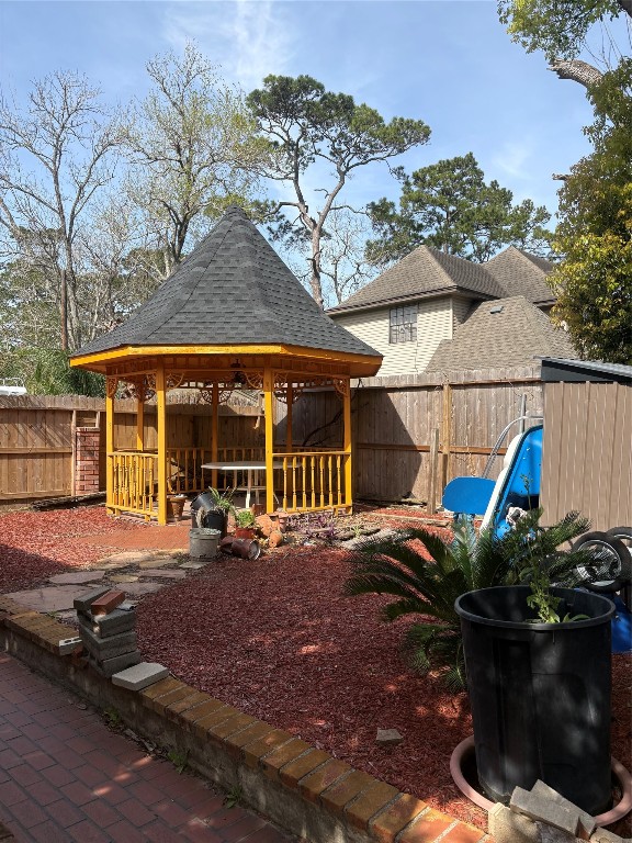 2013 Deats Road Dickinson, TX 77539 - Photo 14 of 50 a view of a house with backyard and sitting area