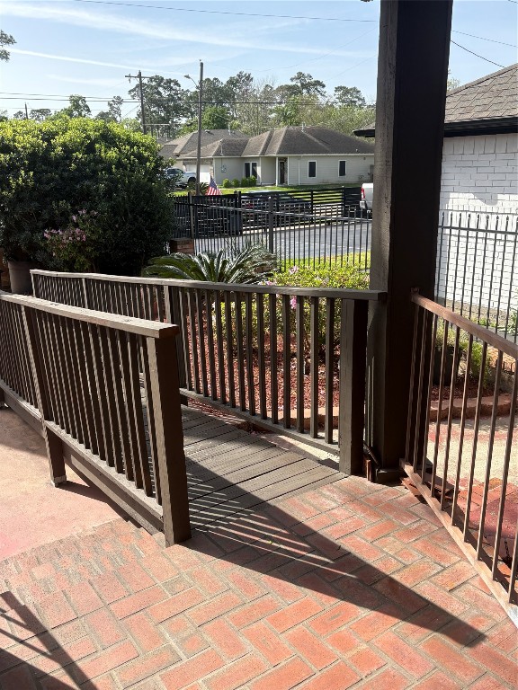 2013 Deats Road Dickinson, TX 77539 - Photo 29 of 50 a view of a balcony with a floor to ceiling window and wooden floor