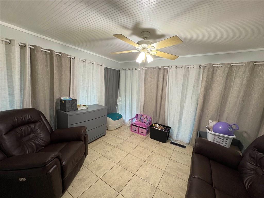15 John Ross Drive Southwest Rome, GA 30165 - Photo 4 of 10 a living room with furniture and a window