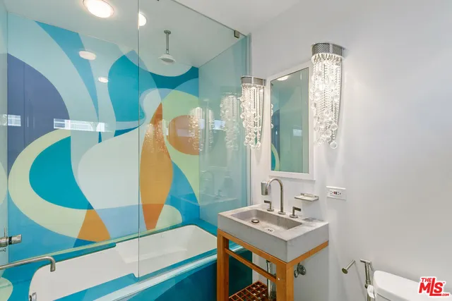 a view of a house with a yard porch and sitting area