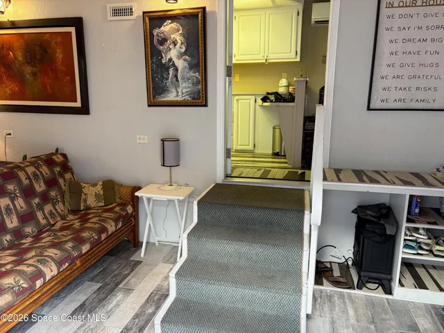 a kitchen with a sink a stove and cabinets