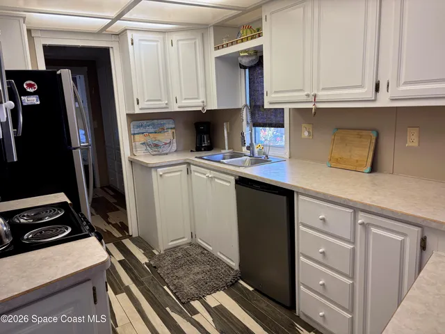 a view of a balcony with furniture