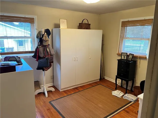 a room with gym equipment and a window