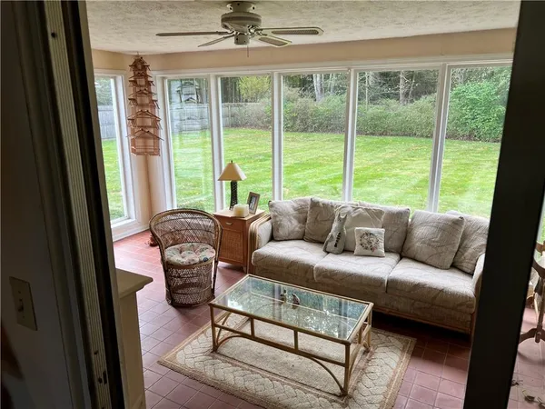 a living room with furniture and a window